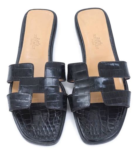 hermes black oran sandals|Hermes oran crocodile sandals.